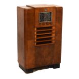 1930's radiogram, 64cm x 34cm x 100cm Condition: One tuning knob missing, light marks and