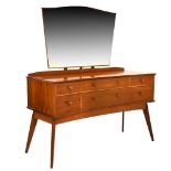 1950's walnut dressing table,120cm x 49cm x 136cm (see lot 393) Condition: Fading, scratches and