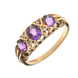 9ct gold dress ring set three amethyst-coloured stones and four small white stones, size M, 2.5g