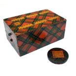 Tartan ware cribbage board containing a smaller Tartanware circular box lid with facsimile Penny Red