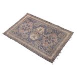 Middle Eastern design wool rug with pale blue field, 136cm x 198cm Condition: Allover fading,