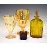 Cut amber glass decanter of compressed hexagonal form, together with two lustre glass vases and a