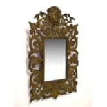 Cast brass acanthus scroll frame mirror, 40cm x 26cm Condition: Slight misshaping to frame, possible