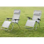 Pair of Lufuma garden reclining loungers/chairs Condition: Some light staining to the seat which may