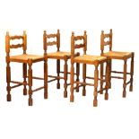 Set of four rush-seated oak breakfast bar stools, each with shaped low ladder back (4)