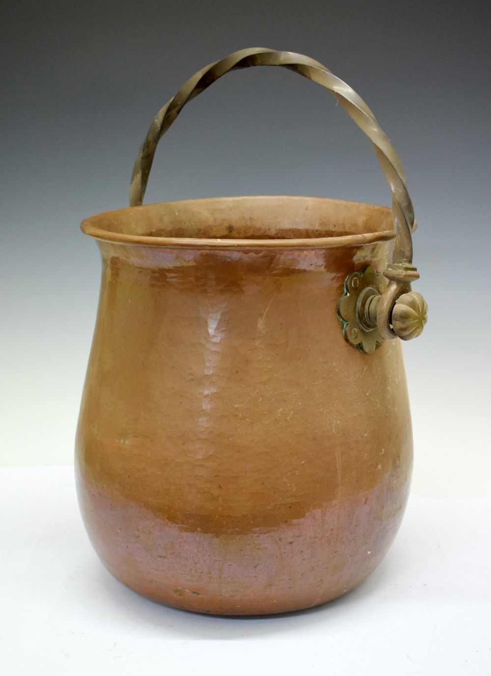 Large copper cauldron log bucket having twisted handle, 35cm x 99cm diameter Condition: Would