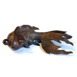 Chinese carved hardwood model of a goldfish, 24cm long Condition: Loss to right fin and tips and