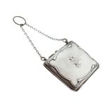 George V silver evening purse with Art Nouveau decoration and fitted interior, 10.5cm wide