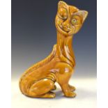 Large early 20th Century art pottery winking cat with glass eye, unmarked, 42cm high Condition: