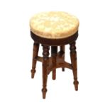 Late Victorian walnut piano stool with adjustable revolving seat Condition: Scuffs and scratches