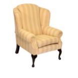 Late 20th Century wingback armchair, 84cm x 108cm x 80cm Condition: Some scuffing to legs, varnish