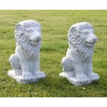 Pair of white plastic stone effect garden ornaments in the form of lions, 37cm high Condition: