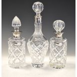 Pair of Elizabeth II silver mounted cut crystal decanters, Birmingham 1994, together with another