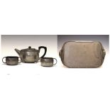 Tudric pewter three-piece tea set, together with tray, 48cm wide Condition: Light scratches