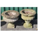 Two stone effect garden planters in the shape of classical urns, tallest measuring 42cm Condition:
