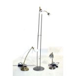Modern floor standing reading light; together with two desk lamps, 135cm high and smaller Condition:
