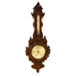 Victorian carved oak-cased barometer, 98cm x 35cm overall Condition: Two carved leaves from left