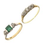 Yellow metal, emerald and diamond three-stone ring, the central square-cut emerald between two small