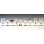 Eight early 19th Century and later cordial/liqueur glasses with wheel engraved bowls and one with