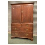 George III oak linen press, two short drawers and two long, 177cm x 106cm x 55cm approx Condition: