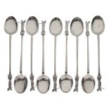 Set of nine George VI silver teaspoons with golfer finials, London 1937, 115g approx Condition: Some