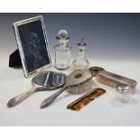 Quantity of silver items to include Elizabeth II four piece silver-mounted dressing table set with