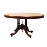 Victorian walnut and string inlaid oval loo table, raised on four scroll supports, 133cm x 102cm x