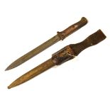 German 'Gebr. Hartkopf', Solingen bayonet having wooden grip and scabbard, marks to blade, blade