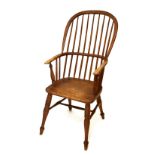 Late 19th Century ash and elm high hoop back Windsor arm chair, 107cm high Condition: A little dry