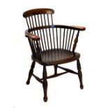 Early 20th Century ash and elm stick-back tub armchair, 86cm high Condition: Broad arm rests are