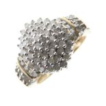 Yellow metal and diamond cluster ring of approximately seventy-nine diamonds including diamond set