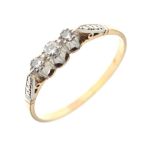 Yellow metal, platinum and three-stone diamond ring, size S, 2.2g gross approx Condition: Shank
