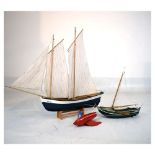 Three model sailing boats, largest measuring 60cm x 74cm high Condition: Paintwork chips present