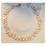 Freshwater pearl necklace, approx 41cm long, together with a pair of cultured pearl earstuds, the