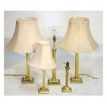 Five brass table lamps Condition: Not tested, sold as seen, one shade appears to be missing, the