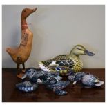 Collection of wooden ducks, late 20th Century, 36cm high and smaller Condition: Duck with losses