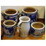 Four saltglaze stoneware pottery pots having underglaze blue decoration, the largest 25cm high