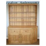 Large pine dresser, canted to one corner, 250cm high approx x 192cm wide Condition: Splits present