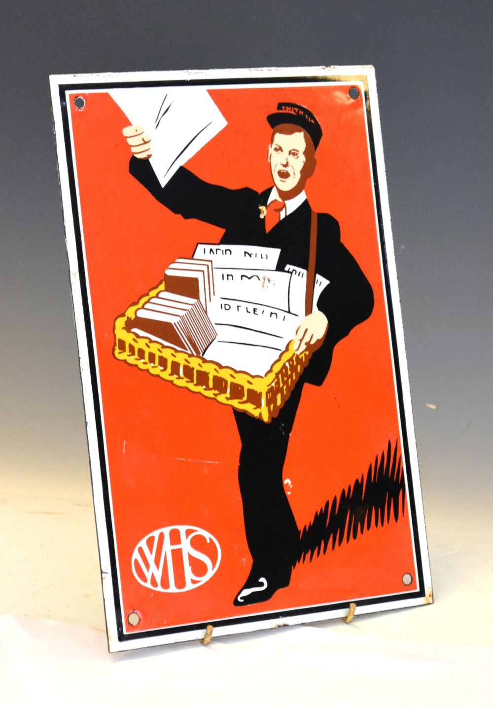 Advertising - Reproduction 'WH Smiths' newspaper seller enamel advertising sign, 27.5cm x 18cm