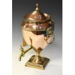 19th Century copper tea urn, having lion head loop handles, 40cm high approx Condition: Signs of