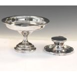 George V silver capstan inkwell, Birmingham 1915, together with a George V silver pedestal dish,