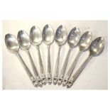 Set of eight white metal teaspoons marked USA, Royal Danish, International Sterling (in the manner