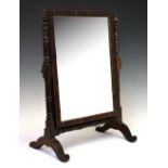 19th Century mahogany swing dressing mirror, 51cm high Condition: Mirror seems to be peeling off
