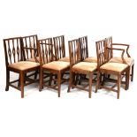 Set of eight late 18th/early 19th Century mahogany country dining chairs (6 plus 2 arm), with drop-