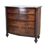 Victorian mahogany bow-front chest of two short over three long drawers having barley-twist columns,