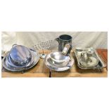 Quantity of silver-plated items to include candlestick, serving dishes, salver etc Condition: Some