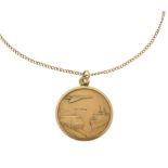 9ct gold medallion modelled with St Christopher to one side, to the other with Concorde, a train and