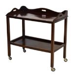 Mahogany two-tier tea trolley, 76cm high x 42.5cm deep x 78cm wide Condition: Various knocks,