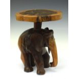 Wooden carved elephant small side table, 34.5cm high Condition: Some cracks in places with general
