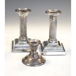 Pair of George VI silver candlesticks in the form of a classical column, 12cm high, Birmingham